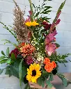 Bouquet champêtre coloré avec glaïeuls, tournesols, roses et fleurs de saison créé par La Maison d’Alcantara à Montréal.webp