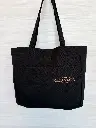 Sac fourre-tout noir réutilisable avec logo La Maison d’Alcantara depuis 1919 à Montréal.webp